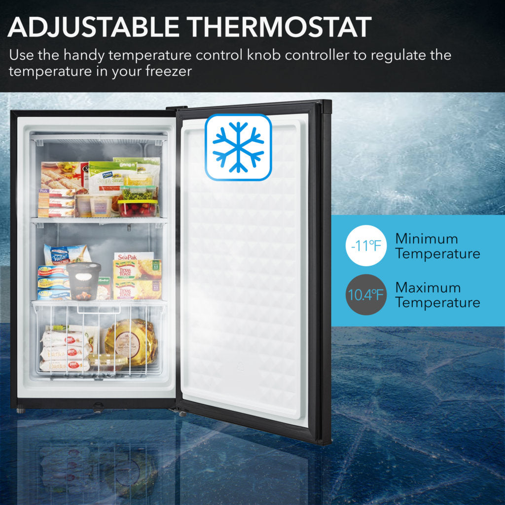 CUF-301BK Open freezer with adjustable thermostat display and food items inside, on a dark blue textured background.
