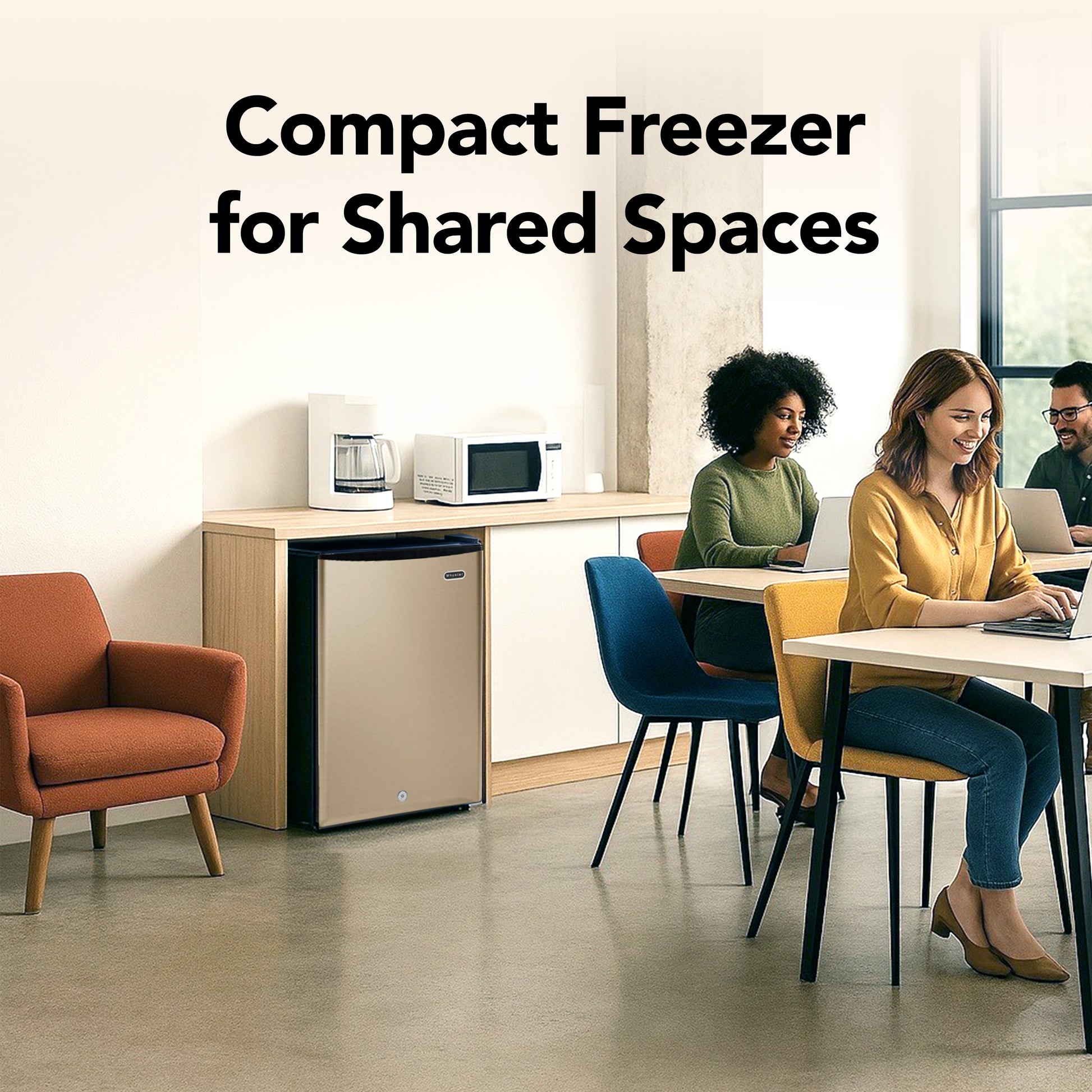 CUF‑210SSG Compact freezer for shared spaces in a modern office setting with people working.