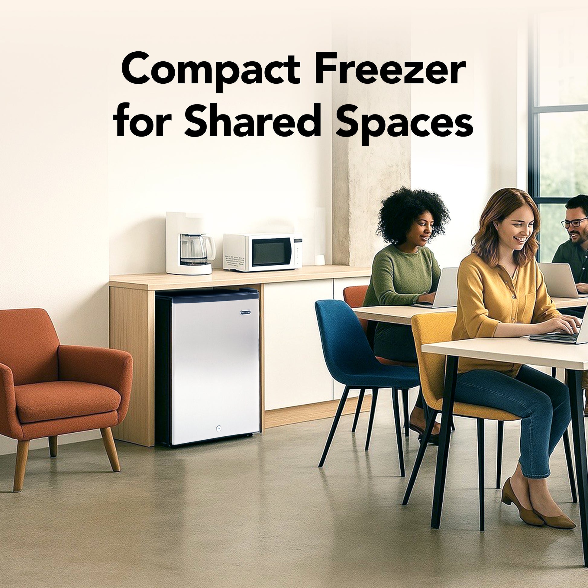 CUF-210SS Compact freezer for shared spaces with people working in a modern office setting