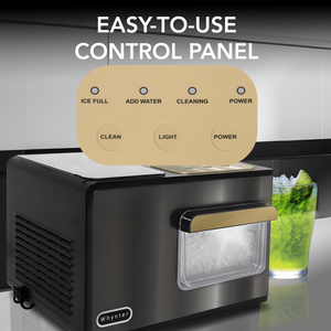 Whynter IBX-388BG Ice maker with control panel and a glass of green drink on a reflective surface.